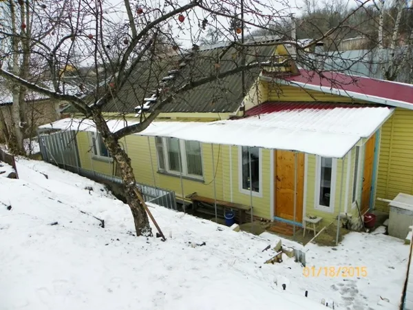 Вид на дом с участка